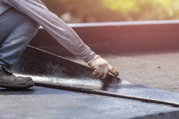 Professional Basement Waterproofing technician working in Fayetteville, TN